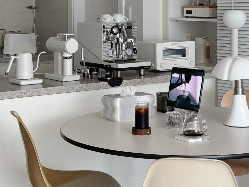 A home espresso bar setup in a kitchen.
