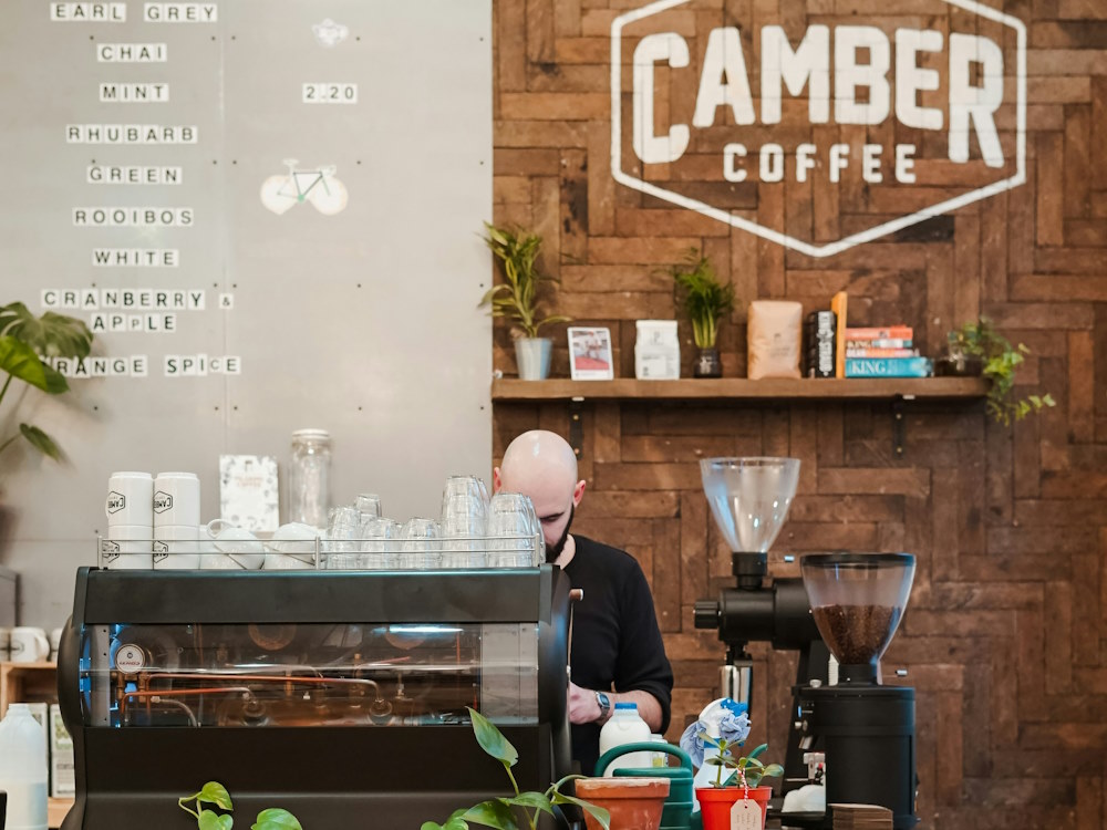 A barista behind the bar at Camber Coffee.