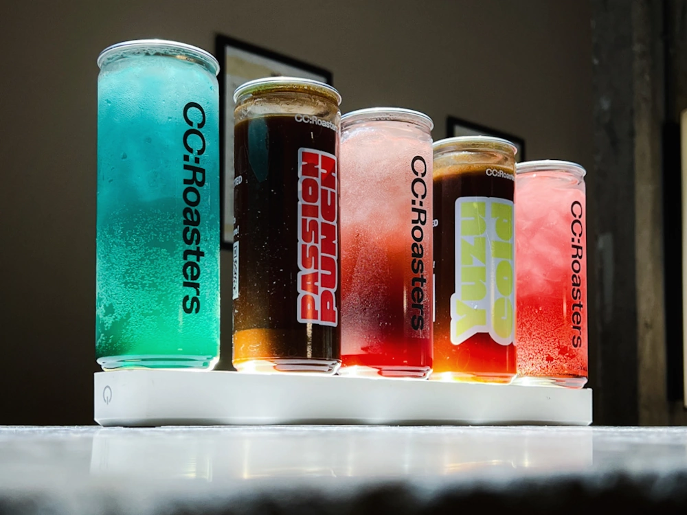 Canned RTD drinks made by CC:Roasters.